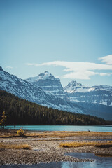 Mountains in Jasper National Park, Canada with the Bow Lake in the foreground