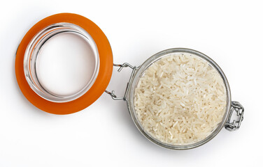 Open jar with raw and dry white rice. Top view. Isolated on white background.