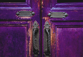 Old purple wooden entrance door