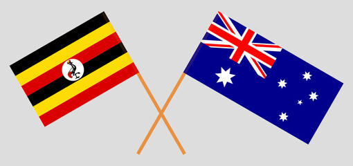 Crossed flags of Uganda and Australia. Official colors. Correct proportion