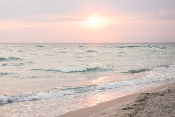 Fototapeta na wymiar Sunset sea with beach