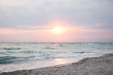 Fototapeta na wymiar Sunset sea with beach 