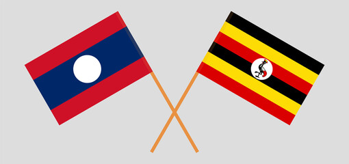 Crossed flags of Laos and Uganda. Official colors. Correct proportion