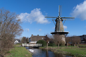 Bergambacht The Netherlands, 26 february 2021, Windmill Den Arend dating from 1869 in a farm...