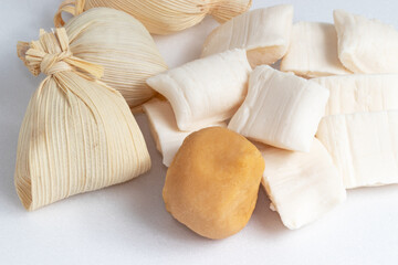 Traditional dulce de leche in a straws and coconut candies (bala de côco). Brazilian sweets..