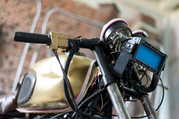 Motorbike handlebar and headlight close up abstract background.