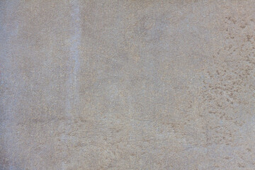 Gray cement plaster wall as background or texture.