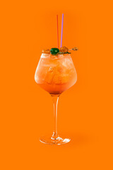 Aperol spritz on orange background 