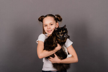 Obraz premium I love my kitten, little girl holding her new pet