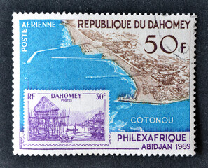 Cancelled postage stamp printed by Dahomey, that shows Aerial view of Cotonou, circa 1969.