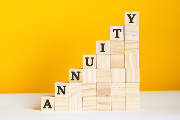 the word annuity is written on a wooden cubes, concept