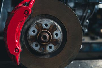 car under repair brake disc and caliper