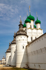 Fototapeta na wymiar The Rostov Kremlin ensemble on a sunny spring day: walls, towers and temples. Rostov the Great.
