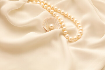 A pearl necklace against white background