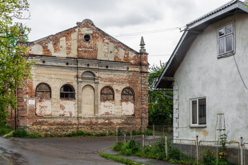 Fototapeta na wymiar Staryi Sambir, Ukraine - 30.05.2021: The ruins of Synagogue in Staryi Sambir.