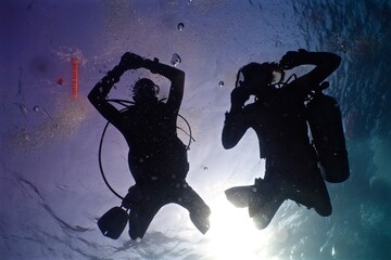 Scuba Diver´s Silhouettes. Koh Tao, Tailand