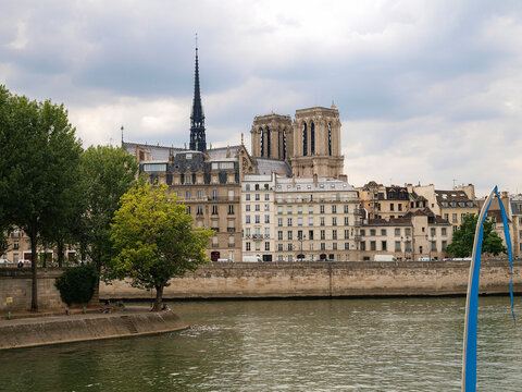 The river Seine in Paris in summer with the Notre Dame cathedral in the background. Image for tourism
