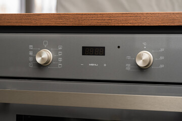 Modern oven mode control button close up