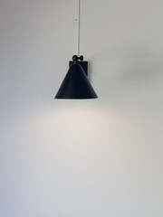 Black lamp hanging from the ceiling