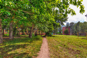 House territory near apartment buildings. Russia