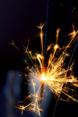 Close up of burning sparkler effect