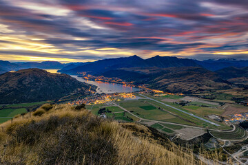 Scenic view of Queenstown City and Airport at Sunset, New Zealand