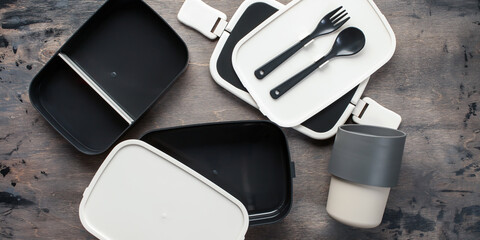 Zero waste lunch concept. Reusable container, coffee cup and cutlery. Top view. Flat lay