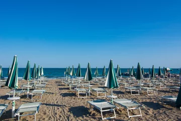 Foto auf Acrylglas Strand von Positano, Amalfiküste, Italien Summer has arrived and the beach umbrellas are about to open