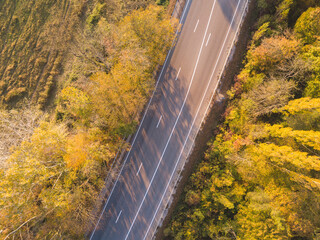 Aerial drone top down shot. Mountain road traffic.