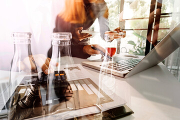 businessman holding coins putting in glass and using calculator. concept saving money and finance accounting.
