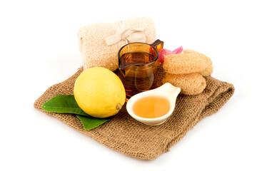 Face mask with lemon ,honey and water isolated on white background.