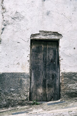 Old Weathered Door.
Old, Weathered, Rusty Door Of An Abandoned Stone And Mud House In A Town In Extremadura, Spain.