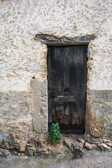 Old Weathered Door.
Old, Weathered, Rusty Door Of An Abandoned Stone And Mud House In A Town In Extremadura, Spain.