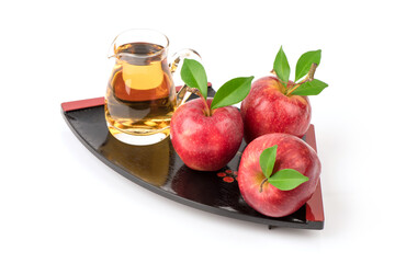 Apple fruit and apple cider vinegar isolated on white background.