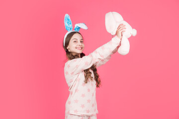 Obraz na płótnie Canvas i love you. adorable kid playing with toy. paschal spring holiday. happy teen girl wear bunny ears