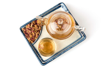 Damask rose ,driedpetals and tea isolated on white background.top view,flat lay.