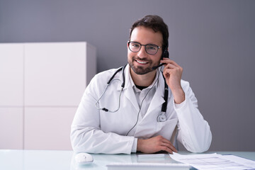 Happy Hospital Receptionist With Headset