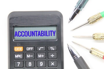 calculator and arrows with the word accountability