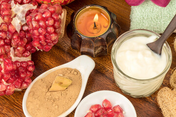 Face mask with pomegranate and yogrut isolated on white background.