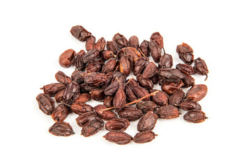 Neem or azadirachta indica ,dried seeds isolated on white background.