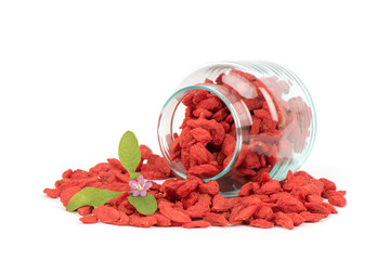Dried goji berry fruits and flower isolated on white background.