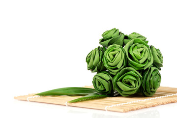 Pandan leaves or pandanus amaryllifolius,fold the leaves into a rose isolated on white background.