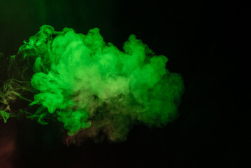 Green and pink steam on a black background.