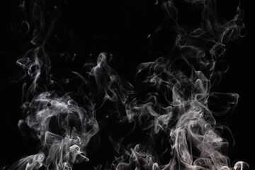 White rising smoke on a black background. Graphic effect