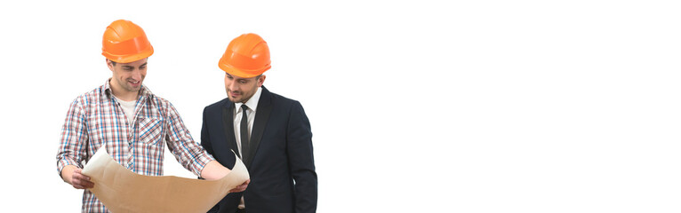 The engineer and a businessman stand with a paper on the white wall background