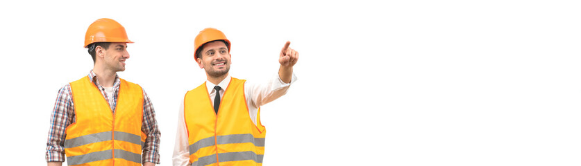 The two engineers gesture on the white wall background