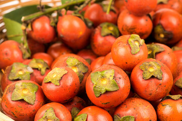 Sacred fig tree or diospyros malabarica fruits isolated on white background.