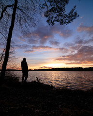 Sunset at lake with silhouete