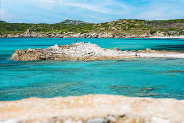 (Selective focus) Stunning view of a coastline bathed by a turquoise, clear sea. Rena Majore is a...