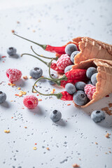 Sweet ice cream with chilli and fruits. Strange icecream.